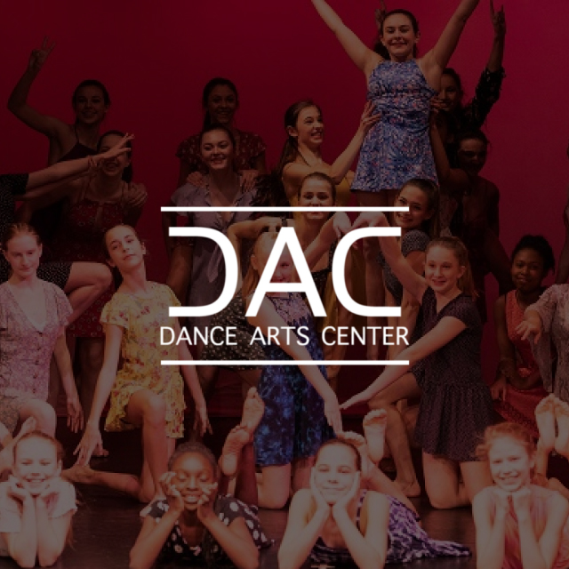 A group of young people behind the DAC logo